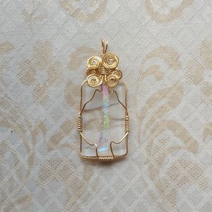 Artisan Rainbow Wire Wrap art glass pendant comes with leather cord